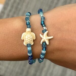 Handmade pack of matching blue beaded bracelets beach theme gold turtle starfish